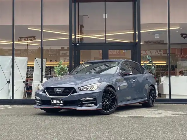 日産 スカイライン ニスモ 福岡県 2024(令6)年 0.1万km未満 グレー ・１オーナー/・サンルーフ/・インテリジェントクルーズコントロール/・ＳＤナビ／ＵＳＢ／Ｂｌｕｅｔｏｏｔｈ／ＣＤ／ＤＶＤ／ＡＵＸ/・全方位カメラ/・ハーフレザーシート/・フルセグ/・純正１９ＡＷ/・プッシュスタート/・パーキングアシスト/・スマートキー/・レーンキープアシスト/・オートライト/・LEDライト/・保証書/・取扱説明書