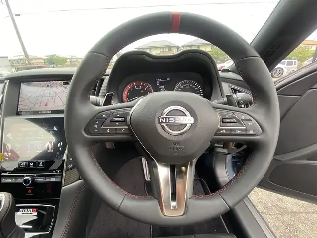 日産 スカイライン ニスモ 福岡県 2024(令6)年 0.1万km未満 グレー ・１オーナー/・サンルーフ/・インテリジェントクルーズコントロール/・ＳＤナビ／ＵＳＢ／Ｂｌｕｅｔｏｏｔｈ／ＣＤ／ＤＶＤ／ＡＵＸ/・全方位カメラ/・ハーフレザーシート/・フルセグ/・純正１９ＡＷ/・プッシュスタート/・パーキングアシスト/・スマートキー/・レーンキープアシスト/・オートライト/・LEDライト/・保証書/・取扱説明書