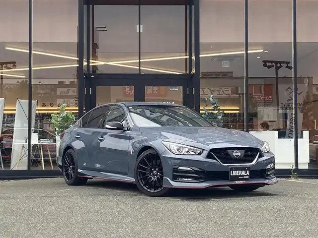 日産 スカイライン ニスモ 福岡県 2024(令6)年 0.1万km未満 グレー ・１オーナー/・サンルーフ/・インテリジェントクルーズコントロール/・ＳＤナビ／ＵＳＢ／Ｂｌｕｅｔｏｏｔｈ／ＣＤ／ＤＶＤ／ＡＵＸ/・全方位カメラ/・ハーフレザーシート/・フルセグ/・純正１９ＡＷ/・プッシュスタート/・パーキングアシスト/・スマートキー/・レーンキープアシスト/・オートライト/・LEDライト/・保証書/・取扱説明書