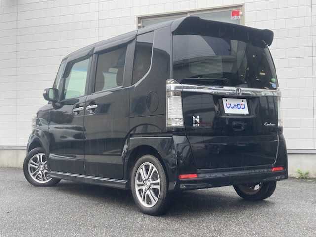 ホンダ Ｎ ＢＯＸ カスタム G Lパッケージ 三重県 2013(平25)年 9万km クリスタルブラックパール (株)IDOMが運営する【じしゃロン四日市店】の自社ローン専用車両になります。こちらは現金またはオートローンご利用時の価格です。自社ローンご希望の方は別途その旨お申付け下さい/社外SDナビ（CD/AM/FM）/ワンセグTV/パドルシフト/片側パワースライド/純正14インチAW/エンジンスタートボタン/スマートキー/アイドリングストップ/純正フロアマット/キセノンライト