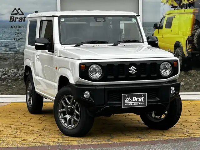 スズキ ジムニー XC 道北・旭川 2024(令6)年 0.3万km ピュアホワイトP ワンオーナー/メモリナビ（AVN-LS01W）/フルセグテレビ/BluetoothAUDIO/バックカメラ/アイドリングストップ/ウィンカーミラー/クルーズコントロール/プッシュスタート/LEDヘッドライト/オートライト/フォグランプ/前席シートヒーター/スズキセーフティーサポート/バックソナー/ヘッドライトウォッシャー