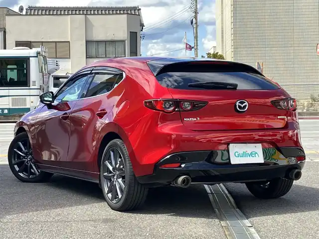 マツダ マツダ３ファストバック 15S ツーリング 三重県 2021(令3)年 2.7万km ソウルレッドクリスタルM ♪ワンオーナー /♪走行26245km/i-ACTIVSENSE/・スマートブレーキサポート/・車線逸脱警報/・ブラインドスポットモニタリング/・レーンキープアシストシステム/・レーダークルーズコントロール/・ハイビームコントロールシステム/・360°モニター/バック/サイド/フロントカメラ/コーナーセンサー/オートブレーキホールド/ヘッドアップディスプレイ/i-stop/前後ドライブレコーダー/ルームミラー型レーダー探知機/スマートキー×3/プッシュスタート/純正ナビ/・HDMI・USB・CD/・DVD再生・フルセグ/・Bluetoothオーディオ/・Apple Car Play/・Android Auto/純正18インチAW/社外16インチAW積込/・205/60R16/・スタッドレスタイヤ/LEDヘッドライト/オートライト/オートワイパー/ウィンカーミラー/オートリトラクタブルミラー/革巻ステアリング/ステアリングスイッチ/プライバシーガラス/フロアマット/ドアバイザー/ETC/サイド/カーテン/ニーエアバック
