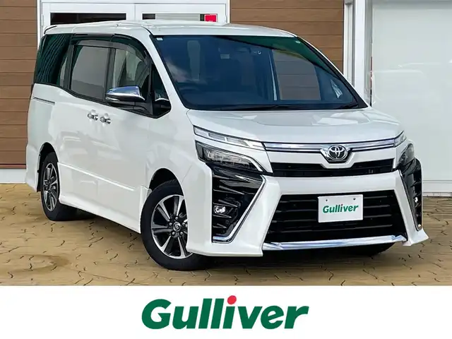 トヨタ ヴォクシー ZS 煌Ⅲ 宮崎県 2021(令3)年 3.8万km ホワイトパールクリスタルシャイン ワンオーナー/ディーラー純正ナビ(NSZN-Z08T)/(BT/AM/FM/CD/DVD)/バックカメラ/フルセグテレビ/スマートキー/ETC/前後ドライブレコーダー/ハーフレザー/両側パワースライドドア/オートマチックハイビーム/プッシュスタート/クルーズコントロール/LEDヘッドライト/アイドリングストップ