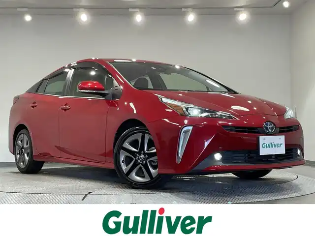 トヨタ プリウス Sツーリングセレクション 愛知県 2022(令4)年 1.8万km エモーショナルレッドⅡ 純正８インチディスプレイナビ　/（AM/FM/Bluetooth/USB/Miracast/CarPlay)/トヨタセーフティセンス　/　　-レーダークルーズコントロール　/　　-プリクラッシュセーフティ/　　-レーントレーニングアシスト/　　-オートマチックハイビーム/　　-ロードサインアシスト/先行車発進告知/ＡＣ１００Ｖ　/ビルトインＥＴＣ　/シートヒーター　/ＬＥＤヘッドライト　/LEDフォグランプ/ドライブレコーダー　/バックカメラ　/純正フロアマット