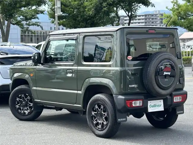 スズキ ジムニー XC 長野県 2020(令2)年 4.9万km ジャングルグリーン 社外ナビ（FM/AM、CD、IPOD、AUX）/ワンセグテレビ/クルーズコントロール追従無/社外ETC/社外ドライブレコーダー/横滑り防止装置/レーンキープアシスト/前席シートヒーター/ダウンヒルアシスト/盗難防止装置/センターデフロック/衝突軽減システム/ダブルサイドエアバック/背面タイヤ/LEDオートライト/社外フロアマット/エンジンスターター/革ステアリング/ドアバイザー/４WD/保証書、取扱説明書/社外アルミ付き冬タイヤ