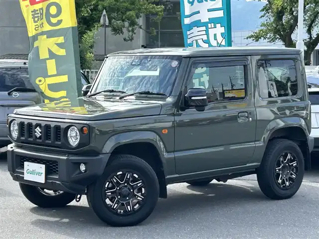 スズキ ジムニー XC 長野県 2020(令2)年 4.9万km ジャングルグリーン 社外ナビ（FM/AM、CD、IPOD、AUX）/ワンセグテレビ/クルーズコントロール追従無/社外ETC/社外ドライブレコーダー/横滑り防止装置/レーンキープアシスト/前席シートヒーター/ダウンヒルアシスト/盗難防止装置/センターデフロック/衝突軽減システム/ダブルサイドエアバック/背面タイヤ/LEDオートライト/社外フロアマット/エンジンスターター/革ステアリング/ドアバイザー/４WD/保証書、取扱説明書/社外アルミ付き冬タイヤ
