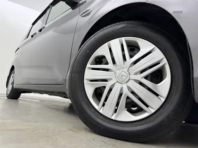 ホンダ フリード ハイブリット G ホンダセンシング 福岡県 2017(平29)年 7.7万km モダンスティールM 純正ナビ　/バックカメラ　/ビルトインＥＴＣ　/アダプティブクルーズコントロール　/プッシュスタート　/衝突被害軽減　/レーンキープ　/横滑り防止装置　/先行車発進検知　/標識認識機能　/ＥＣＯＮ　/両側電動スライドドア
