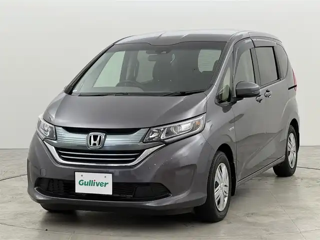 ホンダ フリード ハイブリット G ホンダセンシング 福岡県 2017(平29)年 7.7万km モダンスティールM 純正ナビ　/バックカメラ　/ビルトインＥＴＣ　/アダプティブクルーズコントロール　/プッシュスタート　/衝突被害軽減　/レーンキープ　/横滑り防止装置　/先行車発進検知　/標識認識機能　/ＥＣＯＮ　/両側電動スライドドア