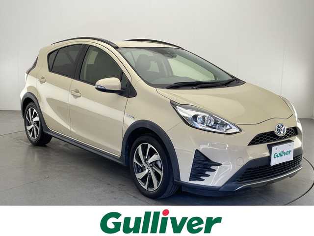 トヨタ アクア クロスオーバー 宮崎県 2018(平30)年 5.7万km ベージュ ワンオーナー/Toyota Safety Sense/〇プリクラシュセーフティ/〇レーンディパーチャーアラート/〇オートマチックハイビーム/〇先行車発進/社外7インチSDナビ/フルセグTV/CD/DVD/Bluetooth/バックカメラ/ハーフレザーシート/シートヒーター/ビルトインETC/純正ドライブレコーダー/純正16インチAW/スマートキー×２/保証書/取扱説明書