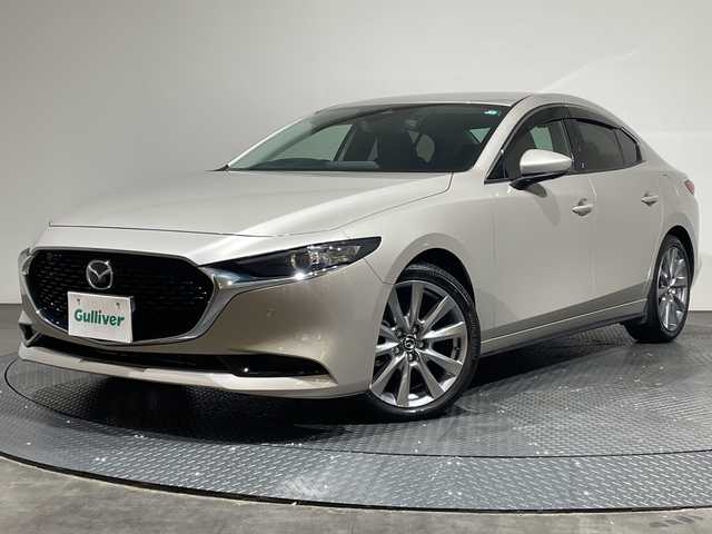 マツダ マツダ３セダン 15S ツーリング 愛媛県 2023(令5)年 3.4万km プラチナクォーツメタリック 純正8.8インチナビ/Bluetooth/フルセグ/USB/全周囲カメラ/レーダークルーズコントロール/衝突被害軽減ブレーキ/レーンキープアシスト/前後コーナーセンサー/ブラインドスポットモニター/LEDヘッドライト/オートマチックハイビーム/オートライト/ドライブレコーダー/ETC/電動格納ミラー/センターコンソール/純正18インチアルミ/純正フロアマット