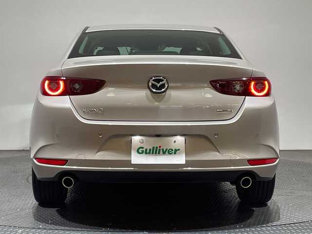 マツダ マツダ３セダン 15S ツーリング 愛媛県 2023(令5)年 3.4万km プラチナクォーツメタリック 純正8.8インチナビ/Bluetooth/フルセグ/USB/全周囲カメラ/レーダークルーズコントロール/衝突被害軽減ブレーキ/レーンキープアシスト/前後コーナーセンサー/ブラインドスポットモニター/LEDヘッドライト/オートマチックハイビーム/オートライト/ドライブレコーダー/ETC/電動格納ミラー/センターコンソール/純正18インチアルミ/純正フロアマット