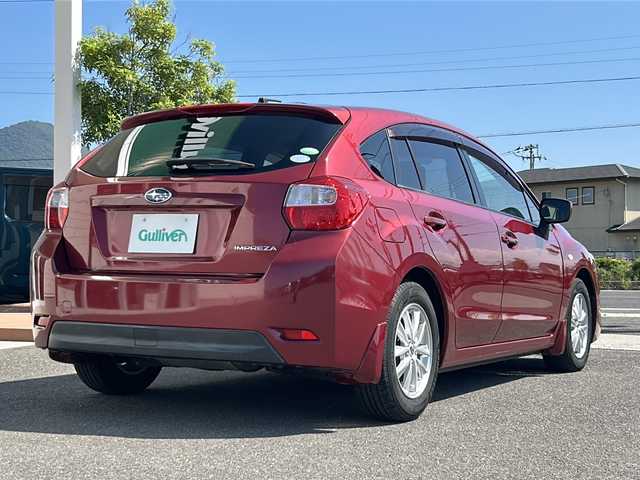 スバル インプレッサ スポーツ 1．6i－L 香川県 2014(平26)年 6.9万km ヴェネチアンレッドパール 社外7インチナビ/フルセグテレビ/CD/DVD再生機能/ドライブレコーダー/HIDヘッドライト/スマートキー