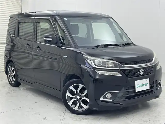 スズキ ソリオ バンディット HV MV Dカメラ ブレーキS 茨城県 2015(平27)年 4.1万km スーパーブラックパール 純正ナビ/・バックカメラ/・フルセグテレビ/・Bluetooth接続/・CDチェンジャー/・AUX（ミュージックプレイヤー接続）/ETC/ドライブレコーダー/両側パワースライドドア/スマートキー/エンジンスタートボタン/シートヒーター/クルーズコントロール/フロントフォグ/純正アルミホイール/LEDヘッドライト/・オートライト/ABS/レーンアシストキープ/横滑り防止装置/盗難防止装置/衝突被害軽減システム