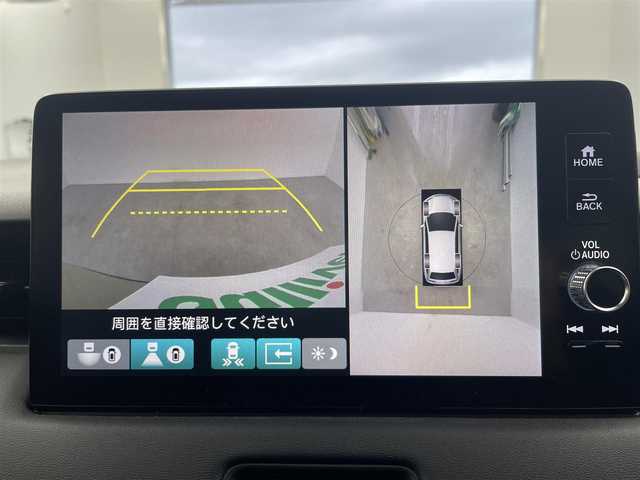 ホンダ ヴェゼル ハイブリッド e:HEV Z 愛知県 2023(令5)年 1.7万km サンドカーキパール 純正9インチディスプレイオーディオ/（BT/AM/FM/フルセグTV）/全方位バックカメラ/ハーフレザーシート/前席シートヒーター/置くだけ充電/電動リアゲート/HondaSENSING/・アダクティブクルーズコントロール/・衝突軽減ブレーキ/・ブラインドスポッとモニター/・レーンキープアシスト/スポーツモード/エコノミーモード/純正18インチAW/純正フロアマット/ドアバイザー/純正フロアマット/トノカバー/純正18インチAW
