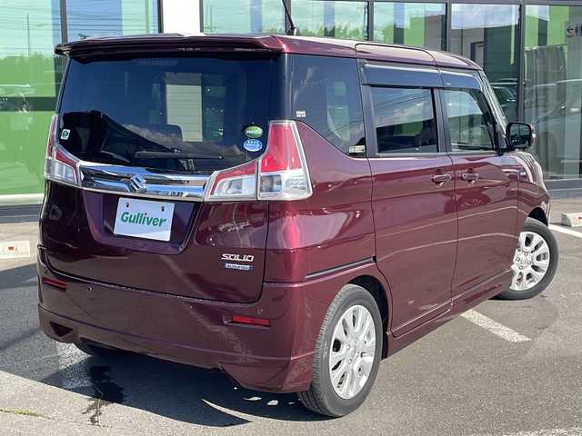 スズキ ソリオ HV MZ 道東・釧路十勝 2019(令1)年 7.4万km クラレットレッドM ・4WD/・社外SDナビ/(フルセグ・CD・DVD・BT・FM・AM)/・レーダークルーズコントロール/・両側パワースライドドア/・車線逸脱警報/・衝突軽減システム/・リアパーキングセンサー/・前席シートヒーター/・横滑り防止/・ETC/・前方ドライブレコーダー/・本革巻きステアリング/・ステアリングスイッチ/・アイドリングストップ/・HIDヘッドライト/・オートライト/・フォグライト/・スマートキー/・プッシュスタート/・社外AW付冬タイヤ　積込