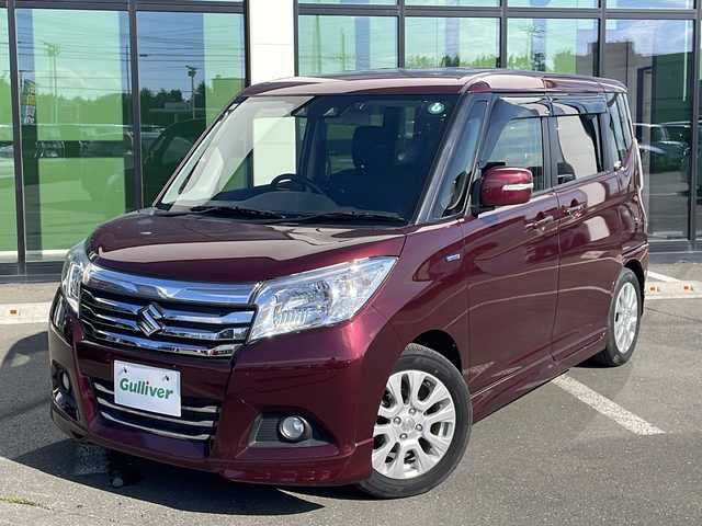 スズキ ソリオ HV MZ 道東・釧路十勝 2019(令1)年 7.4万km クラレットレッドM ・4WD/・社外SDナビ/(フルセグ・CD・DVD・BT・FM・AM)/・レーダークルーズコントロール/・両側パワースライドドア/・車線逸脱警報/・衝突軽減システム/・リアパーキングセンサー/・前席シートヒーター/・横滑り防止/・ETC/・前方ドライブレコーダー/・本革巻きステアリング/・ステアリングスイッチ/・アイドリングストップ/・HIDヘッドライト/・オートライト/・フォグライト/・スマートキー/・プッシュスタート/・社外AW付冬タイヤ　積込