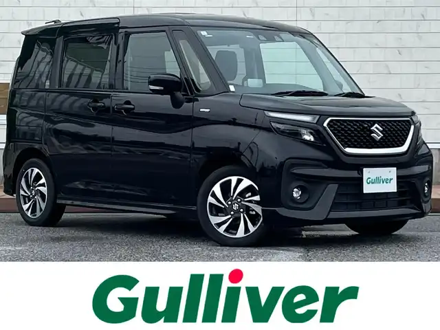 スズキ ソリオ バンディット HV MV 滋賀県 2024(令6)年 0.3万km スーパーブラックパール デュアルカメラブレーキサポート/全方位カメラ/ヘッドアップディスプレイ/コーナーセンサー/両側パワースライドドア/クルーズコントロール/レーントレーシングアシスト/アイドリングストップ/横滑り防止装置/革巻きステアリング/ステアリングスイッチ/オートライト/LEDヘッドライト/フロントフォグライト/純正フロアマット/電格ミラー/スマートキー/スペアキー