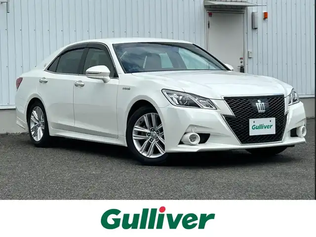 トヨタ クラウン ハイブリッド アスリートS 熊本県 2013(平25)年 4.8万km ホワイトパールクリスタルシャイン 純正ナビ/・フルセグTV/BT/DVD/AM/FM/バックカメラ/インテリジェントクリアランスソナー/プリクラッシュセーフティ機能/横滑り防止装置/車両接近警告機能/レーンキープアシスト/ACC/パワーシート/・シートヒーター/革巻きステアリング/・ステアリングスイッチ/・ステアリングヒーター/オートライト/・フォグランプ/電動格納ミラー/・ウィンカーミラー/純正ドアバイザー/純正AW/ドライブレコーダー/ビルトインETC/リアサンシェード