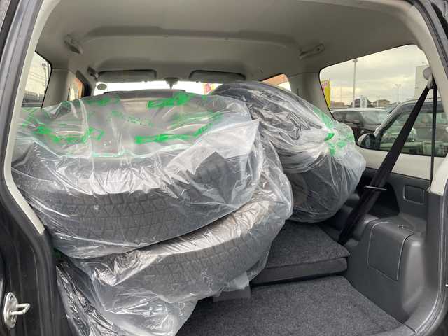 スズキ ジムニー クロスアドベンチャー 石川県 2013(平25)年 5.5万km 黒 社外ナビ　ワンセグＴＶ　キーレス　４ＷＤ　ターボ　電動ミラー　純正アルミホイール　スタッドレス＆ＡＷ積み込み