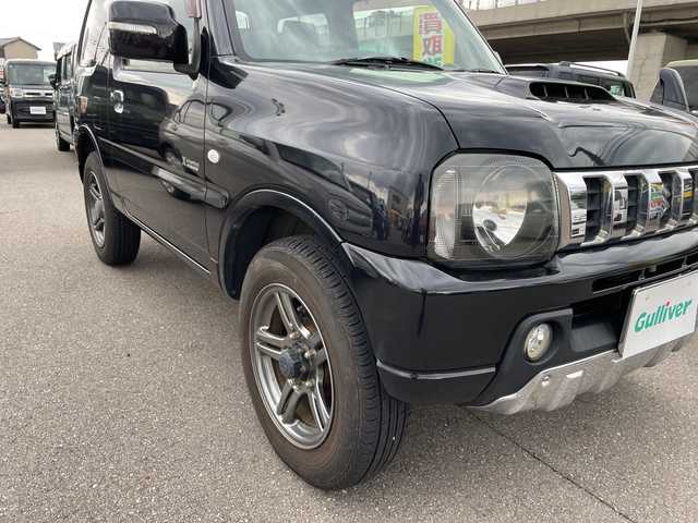 スズキ ジムニー クロスアドベンチャー 石川県 2013(平25)年 5.5万km 黒 社外ナビ　ワンセグＴＶ　キーレス　４ＷＤ　ターボ　電動ミラー　純正アルミホイール　スタッドレス＆ＡＷ積み込み