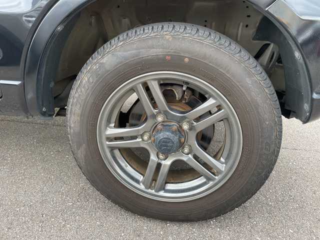 スズキ ジムニー クロスアドベンチャー 石川県 2013(平25)年 5.5万km 黒 社外ナビ　ワンセグＴＶ　キーレス　４ＷＤ　ターボ　電動ミラー　純正アルミホイール　スタッドレス＆ＡＷ積み込み