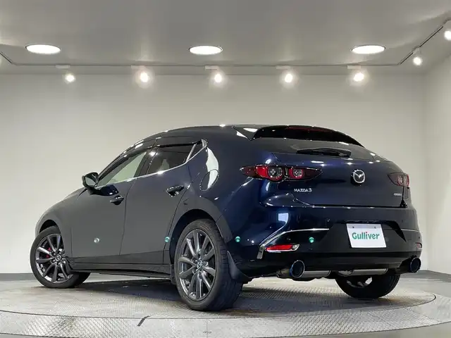 マツダ マツダ３ファストバック 15S ツーリング 愛知県 2020(令2)年 1.5万km ディープクリスタルブルーマイカ 純正８．８インチナビ/衝突軽減ブレーキ/レーダークルーズコントロール/レーンキープアシスト/ブラインドスポットモニター/コーナーセンサー/ヘッドアップディスプレイ/前後ドライブレコーダー/ＥＴＣ/ＬＥＤヘッドライト/柿本マフラー/アイドリングストップ/ISOFIX