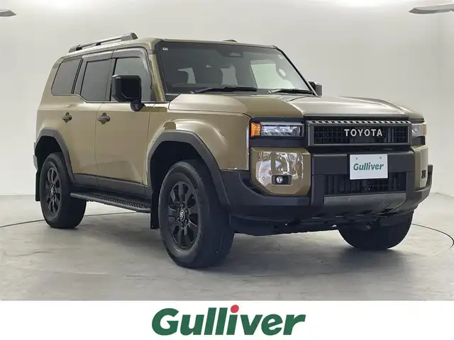 トヨタ ランドクルーザー ２５０ VX ファーストエディション 福井県 2024(令6)年 0.2万km ベージュＭ ４WD/サンルーフ/純正12.3インチディスプレイオーディオ/フルセグTV/TV/Bluetooth/Miracast/USB/AM/FM/トヨタチームメイト/トヨタセーフティセンス/・衝突軽減システム/・ブラインドスポットモニター/・安心降車アシスト/・レーダークルーズコントロール/・パノラミックビューモニター/・クリアランスソナー/・オートマチックハイビーム/ビルトインETC2.0/デジタルインナーミラー/ステアリングスイッチ/カラーメーター/マルチインフォメーションディスプレイ/電動パーキングブレーキ/ブレーキホールド/パワーシート/シートヒーター/シートベンチレーション/革巻きステアリング/ステアリングヒーター/ステアリングチルド機構/パワーバックドア