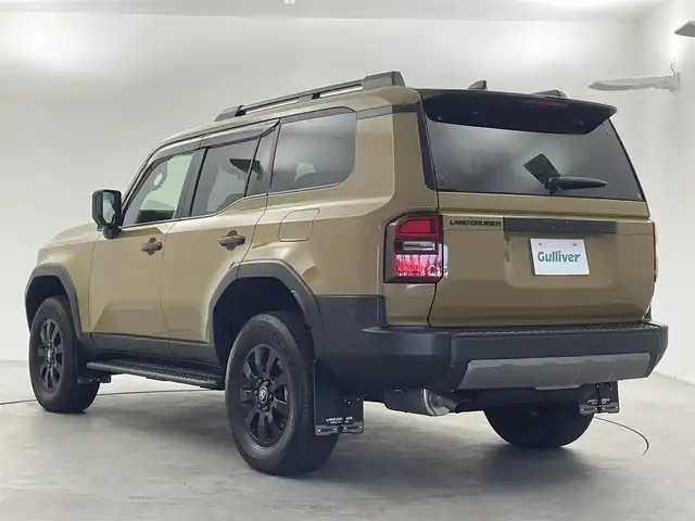 トヨタ ランドクルーザー ２５０ VX ファーストエディション 福井県 2024(令6)年 0.2万km ベージュＭ ４WD/サンルーフ/純正12.3インチディスプレイオーディオ/フルセグTV/TV/Bluetooth/Miracast/USB/AM/FM/トヨタチームメイト/トヨタセーフティセンス/・衝突軽減システム/・ブラインドスポットモニター/・安心降車アシスト/・レーダークルーズコントロール/・パノラミックビューモニター/・クリアランスソナー/・オートマチックハイビーム/ビルトインETC2.0/デジタルインナーミラー/ステアリングスイッチ/カラーメーター/マルチインフォメーションディスプレイ/電動パーキングブレーキ/ブレーキホールド/パワーシート/シートヒーター/シートベンチレーション/革巻きステアリング/ステアリングヒーター/ステアリングチルド機構/パワーバックドア