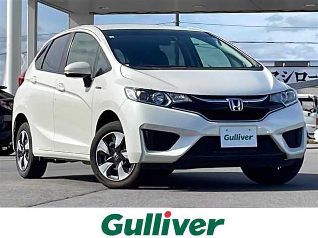 ホンダ フィット ハイブリット Lパッケージ 道北・旭川 2016(平28)年 4.5万km プレミアムホワイトパールⅡ /4WD//禁煙車//寒冷地仕様//純正ナビ/BT/SD/CD/DVD/ワンセグ//衝突軽減ブレーキ//誤発進抑制機能//クルーズコントロール//ハーフレザーシート//ステアリングスィッチ//革巻きステアリング//オートエアコン//オートライト//プッシュスタート//LEDヘッドライト//ヘッドライトウィンカー//ETC//ドライブレコーダー//フロントデアイサー//取扱説明書//保証書//スペアキー