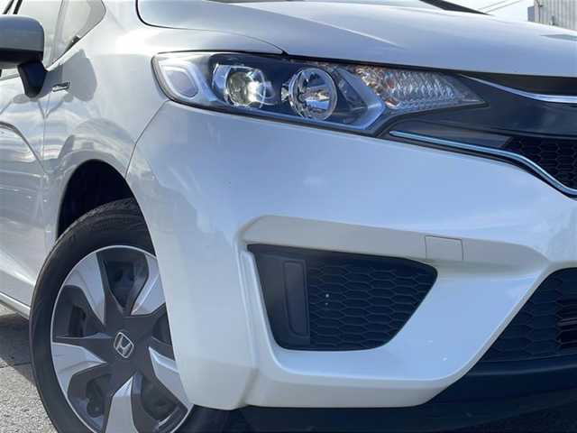 ホンダ フィット ハイブリット Lパッケージ 道北・旭川 2016(平28)年 4.5万km プレミアムホワイトパールⅡ /4WD//禁煙車//寒冷地仕様//純正ナビ/BT/SD/CD/DVD/ワンセグ//衝突軽減ブレーキ//誤発進抑制機能//クルーズコントロール//ハーフレザーシート//ステアリングスィッチ//革巻きステアリング//オートエアコン//オートライト//プッシュスタート//LEDヘッドライト//ヘッドライトウィンカー//ETC//ドライブレコーダー//フロントデアイサー//取扱説明書//保証書//スペアキー