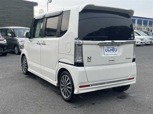 ホンダ Ｎ ＢＯＸ カスタム G ターボ Lパッケージ 山形県 2016(平28)年 9.9万km プレミアムホワイトパールⅡ (株)IDOMが運営する【じしゃロン山形店】の自社ローン専用車両になります。こちらは現金またはオートローンご利用時の価格です。自社ローンご希望の方は別途その旨お申付け下さい。/社外メモリナビ/ワンセグ/DVD/CD/SD/BT/AUX/クルーズコントロール/パドルシフト/ビルトインETC/両側パワースライドドア/横滑り防止装置/電動格納ミラー/ISOFIX