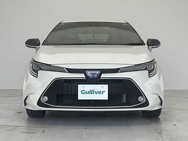 トヨタ カローラツーリング ハイブリッド ダブルバイビー 愛知県 2020(令2)年 5.1万km ホワイトパールクリスタルシャイン 衝突軽減システム/純正9型ディズプレイオーディオ　ナビ機能あり/レーダークルーズコントロール/シートヒーター/フルセグ/Bluetooth/バックカメラ/コーナーセンサー/純正アルミホイール/ETC2.0/ブラインドスポットモニター/LEDヘッドライト/ステアリングヒーター/オートマチックハイビーム/ドライブレコーダー/ステアリングスイッチ/スマートキー/プッシュスタート