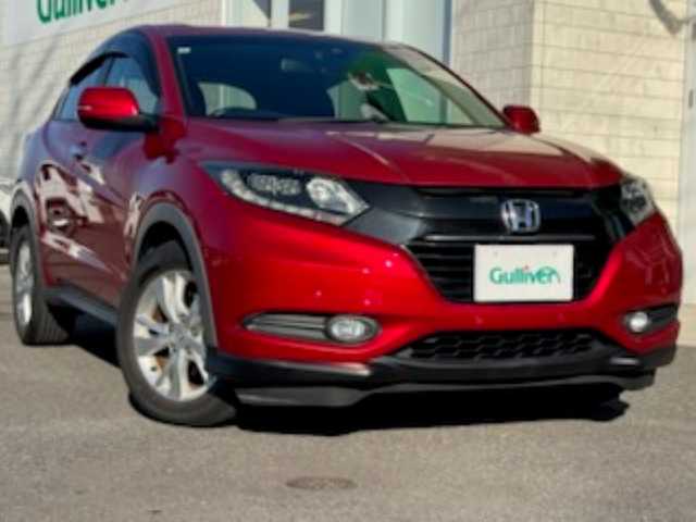 ホンダ ヴェゼル X ホンダセンシング 香川県 2016(平28)年 9万km 赤 社外ナビ（フルセグTV/CD/DVD/BT)/バックカメラ/アダプティブクルーズコントロール/標識認知機能/ドライブレコーダー/コーナーセンサー/アイドリングストップ/ビルトインETC/ハロゲンヘッドライト/オートライト/スペアキー