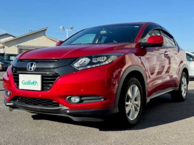 ホンダ ヴェゼル X ホンダセンシング 香川県 2016(平28)年 9万km 赤 社外ナビ（フルセグTV/CD/DVD/BT)/バックカメラ/アダプティブクルーズコントロール/標識認知機能/ドライブレコーダー/コーナーセンサー/アイドリングストップ/ビルトインETC/ハロゲンヘッドライト/オートライト/スペアキー