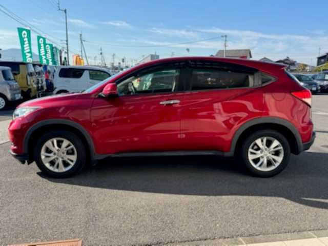 ホンダ ヴェゼル X ホンダセンシング 香川県 2016(平28)年 9万km 赤 社外ナビ（フルセグTV/CD/DVD/BT)/バックカメラ/アダプティブクルーズコントロール/標識認知機能/ドライブレコーダー/コーナーセンサー/アイドリングストップ/ビルトインETC/ハロゲンヘッドライト/オートライト/スペアキー