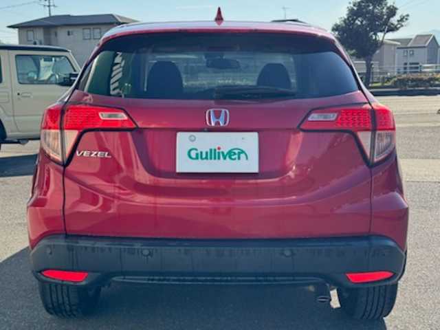 ホンダ ヴェゼル X ホンダセンシング 香川県 2016(平28)年 9万km 赤 社外ナビ（フルセグTV/CD/DVD/BT)/バックカメラ/アダプティブクルーズコントロール/標識認知機能/ドライブレコーダー/コーナーセンサー/アイドリングストップ/ビルトインETC/ハロゲンヘッドライト/オートライト/スペアキー