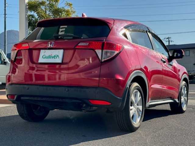 ホンダ ヴェゼル X ホンダセンシング 香川県 2016(平28)年 9万km 赤 社外ナビ（フルセグTV/CD/DVD/BT)/バックカメラ/アダプティブクルーズコントロール/標識認知機能/ドライブレコーダー/コーナーセンサー/アイドリングストップ/ビルトインETC/ハロゲンヘッドライト/オートライト/スペアキー
