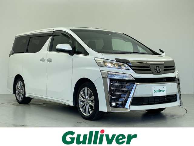 トヨタ ヴェルファイア ゴールデンアイズⅢ 愛知県 2022(令4)年 2.7万km ホワイトパールクリスタルシャイン 純正ビルトインナビ/・Bluetooth/・Miracast/・フルセグ（テレビキット装着）/純正CD/DVDデッキ/バックカメラ/純正フリップダウンモニター/DSRC対応ビルトインETC/電動ムーンルーフ/両側パワースライドドア/パワーバックドア/２列目オットマンシート/トヨタセーフティセンス/・プリクラッシュセーフティ/・レーントレースアシスト/・パーキングサポートブレーキ/・レーダークルーズコントロール/・ブラインドスポットモニター/・リヤクロストラフィックアラート/・ロードサインアシスト/電動パーキングブレーキ/AC100V電源コンセント/横滑り防止/プッシュスタート