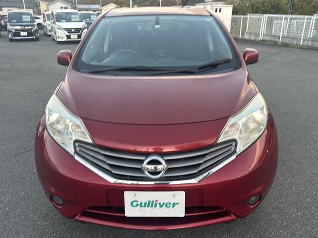 日産 ノート X 山梨県 2013(平25)年 8.4万km ラディアントレッド ポータブルナビ/ライトレベライザー/アイドリングストップ/スマートキー