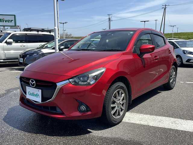 マツダ デミオ XD ツーリング Lパッケージ 新潟県 2015(平27)年 9.2万km ソウルレッドプレミアムメタリック 4WD/スマートキー/ターボ車/マツダコネクトナビ/CD/DVD/BT/バックカメラ/ETC/革シート/フルセグ/ヘッドアップディスプレイ/純正AWセット積み込み【サマータイヤ】/取扱説明書/新車時保証書