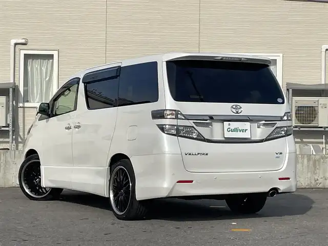 トヨタ ヴェルファイア 3．5Z Gエディション 青森県 2013(平25)年 6.9万km ホワイトパールクリスタルシャイン 純正ＨＤＤナビ地デジバックモニター/（ＮＨＢＡ－Ｘ６２Ｇ）/フリップダウンモニター/（Ｖ１１Ｔ－Ｒ６２Ｃ）/両側電動スライドドア/記録簿６枚/本革シート/シートヒーター/寒冷地仕様/AFS/Fモデリスタスポイラー/ビルトインETC/社外20AW/新車時保証書/取扱説明書