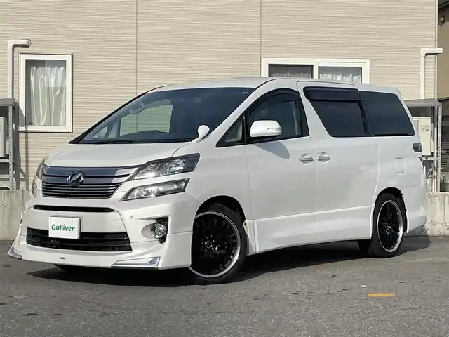 トヨタ ヴェルファイア 3．5Z Gエディション 青森県 2013(平25)年 6.9万km ホワイトパールクリスタルシャイン 純正ＨＤＤナビ地デジバックモニター/（ＮＨＢＡ－Ｘ６２Ｇ）/フリップダウンモニター/（Ｖ１１Ｔ－Ｒ６２Ｃ）/両側電動スライドドア/記録簿６枚/本革シート/シートヒーター/寒冷地仕様/AFS/Fモデリスタスポイラー/ビルトインETC/社外20AW/新車時保証書/取扱説明書