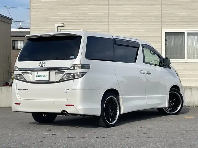 トヨタ ヴェルファイア 3．5Z Gエディション 青森県 2013(平25)年 6.9万km ホワイトパールクリスタルシャイン 純正ＨＤＤナビ地デジバックモニター/（ＮＨＢＡ－Ｘ６２Ｇ）/フリップダウンモニター/（Ｖ１１Ｔ－Ｒ６２Ｃ）/両側電動スライドドア/記録簿６枚/本革シート/シートヒーター/寒冷地仕様/AFS/Fモデリスタスポイラー/ビルトインETC/社外20AW/新車時保証書/取扱説明書