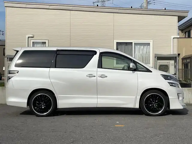 トヨタ ヴェルファイア 3．5Z Gエディション 青森県 2013(平25)年 6.9万km ホワイトパールクリスタルシャイン 純正ＨＤＤナビ地デジバックモニター/（ＮＨＢＡ－Ｘ６２Ｇ）/フリップダウンモニター/（Ｖ１１Ｔ－Ｒ６２Ｃ）/両側電動スライドドア/記録簿６枚/本革シート/シートヒーター/寒冷地仕様/AFS/Fモデリスタスポイラー/ビルトインETC/社外20AW/新車時保証書/取扱説明書