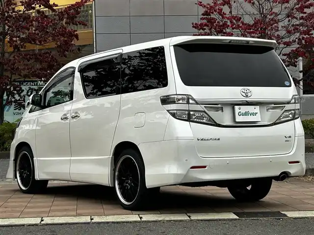 トヨタ ヴェルファイア 3．5Z Gエディション 福島県 2013(平25)年 6.9万km ホワイトパールクリスタルシャイン 純正ＨＤＤナビ/（ＮＨＢＡ－Ｘ６２Ｇ）/地デジ/バックモニター/フリップダウンモニター/（Ｖ１１Ｔ－Ｒ６２Ｃ）/両側電動スライドドア/記録簿６枚/本革シート/シートヒーター/AFS/Fモデリスタスポイラー/ビルトインETC/社外20AW/新車時保証書/取扱説明書