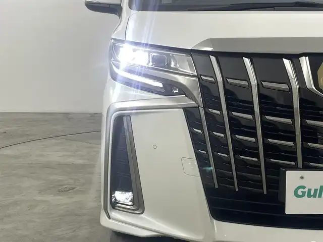 トヨタ アルファード S タイプゴールドⅢ 福島県 2022(令4)年 4.2万km ホワイトパールクリスタルシャイン トヨタセーフティセンス/・車線逸脱警報装置/・盗難防止装置/・衝突被害軽減ブレーキ/・コーナーセンサー前後/・ブラインドスポット/・デジタルインナーミラー/・レーンキープアシスト/・リアクロストラフィックアラート/・ロードサインアシスト/・レーダークルーズコントロール/・オートブレーキホールド/・電子パーキング/・オートマチックハイビーム/純正ナビ付ディスプレイオーディオ/・フルセグTV/BT/USB/AM/FM/・前後純正ドライブレコーダー/・バックカメラ/・ETC/両側パワースライドドア/・電動リアゲート/革張ステアリング/・ステアリングリモコン/ハーフレザーシート/ウォークスルー/・3列シート/・オットマン/プッシュスタート/・スマートキー/電動格納ミラー/・ウィンカーミラー/LEDヘッドライト/・フォグライト/・オートライト/サンルーフ/ドアバイザー/純正18インチアルミ/純正フロアマット/冬タイヤ積込み