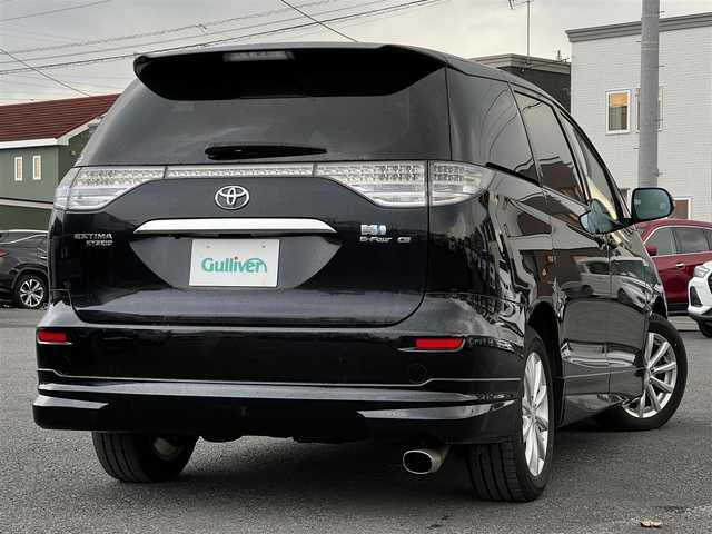 トヨタ エスティマ ハイブリッド G 道央・札幌 2006(平18)年 14.4万km ブラック ４WD/寒冷地仕様/純正HDDナビ/AM/FM/CD/DVD/ワンセグ/純正フリップダウンモニター/横滑り防止装置/クルーズコントロール/バックカメラ/サイドカメラ/フロントカメラ/SNOWMODE/EVMODE/両側パワースライドドア/D席パワーシート/革巻きステアリング/ワイパーデアイサー/AC100V/プッシュスタート/スマートキー/キセノンヘッドライト/オートライト/フォグランプ/電動格納ミラー/ウィンカーミラー/純正フロアマット/スペアキー/社外エンジンスターター