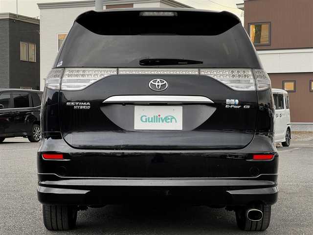 トヨタ エスティマ ハイブリッド G 道央・札幌 2006(平18)年 14.4万km ブラック ４WD/寒冷地仕様/純正HDDナビ/AM/FM/CD/DVD/ワンセグ/純正フリップダウンモニター/横滑り防止装置/クルーズコントロール/バックカメラ/サイドカメラ/フロントカメラ/SNOWMODE/EVMODE/両側パワースライドドア/D席パワーシート/革巻きステアリング/ワイパーデアイサー/AC100V/プッシュスタート/スマートキー/キセノンヘッドライト/オートライト/フォグランプ/電動格納ミラー/ウィンカーミラー/純正フロアマット/スペアキー/社外エンジンスターター