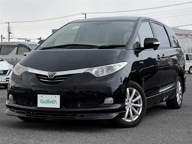 トヨタ エスティマ ハイブリッド G 道央・札幌 2006(平18)年 14.4万km ブラック ４WD/寒冷地仕様/純正HDDナビ/AM/FM/CD/DVD/ワンセグ/純正フリップダウンモニター/横滑り防止装置/クルーズコントロール/バックカメラ/サイドカメラ/フロントカメラ/SNOWMODE/EVMODE/両側パワースライドドア/D席パワーシート/革巻きステアリング/ワイパーデアイサー/AC100V/プッシュスタート/スマートキー/キセノンヘッドライト/オートライト/フォグランプ/電動格納ミラー/ウィンカーミラー/純正フロアマット/スペアキー/社外エンジンスターター