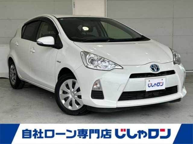 トヨタ アクア S 沖縄県 2014(平26)年 6.9万km ライムホワイトパールクリスタルシャイン (株)IDOMが運営する【じしゃロンコザ店】の自社ローン専用車両になりますこちらは現金またはオートローンご利用時の価格です。自社ローンご希望の方は別途その旨お申付け下さい/純正ナビ　/フルセグＴＶ　/ＥＴＣ　/Ｂｌｕｅｔｏｏｔｈ接続　/ＣＤ再生　/バックカメラ　/アイドリングストップ　/横滑り防止装置　/オートライト　/プッシュスタート　/スマートキー　/スペアキー　/取扱説明書